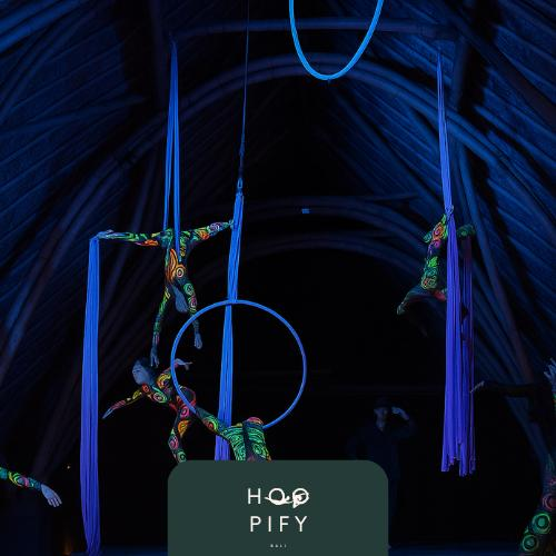 UV neon aerial performance with Hoopify Bali hoops on stage